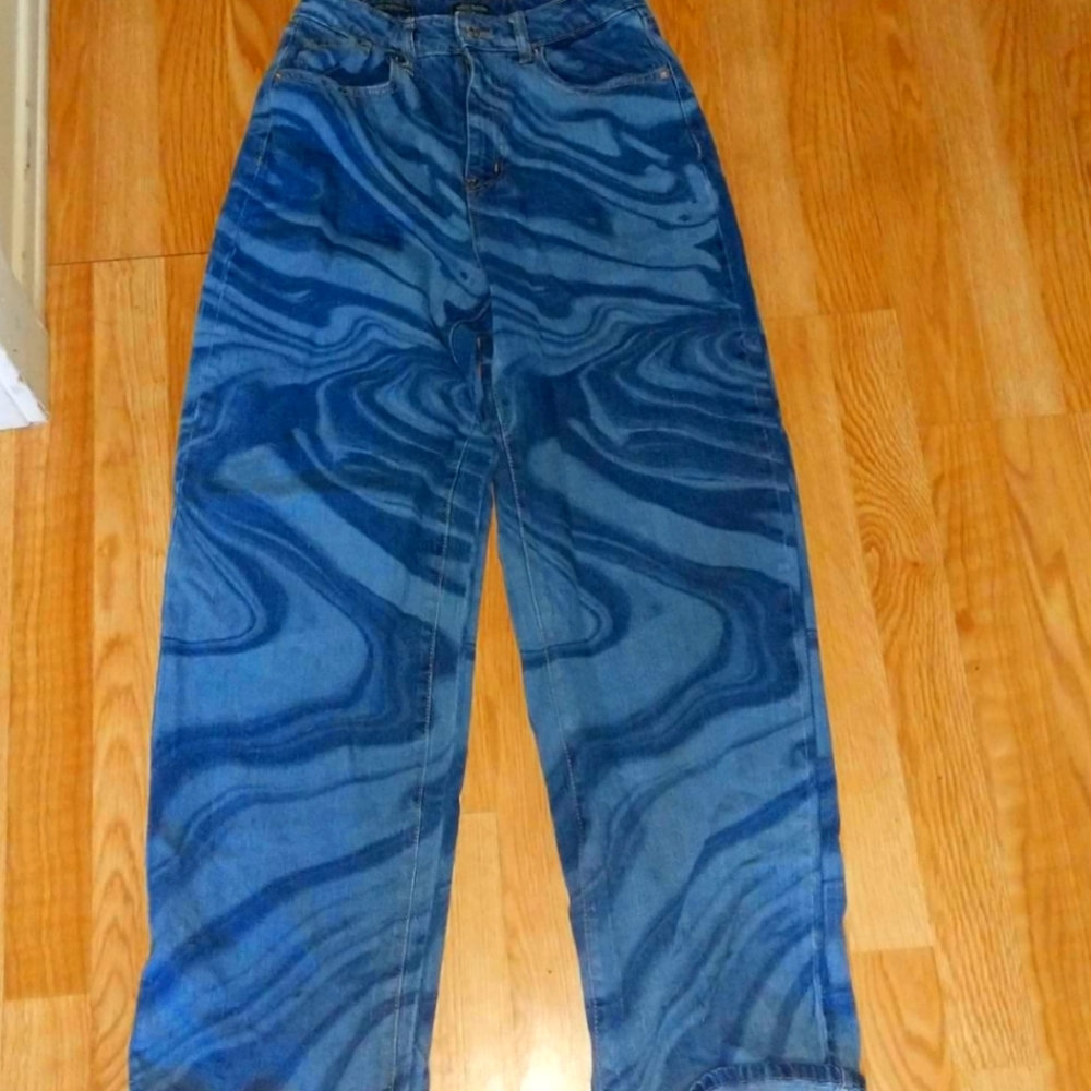 Blue swirly baggy jeans from target. Fit tight in waist band. Never worn no tags